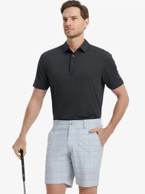 Model in BLACK Jacquard Polo posing with golf club — active and athletic on the front view