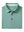 Folded Beryl Green Everyday Classic Solid Polo neatly laid out for display