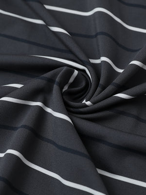Close-up of dark grey stripe stylish stripe jersey golf polo fabric showing smooth texture and breathable knit.