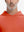 Close-up from nose to chest, showing soft collar texture and stitching detail of the orange hoodie.