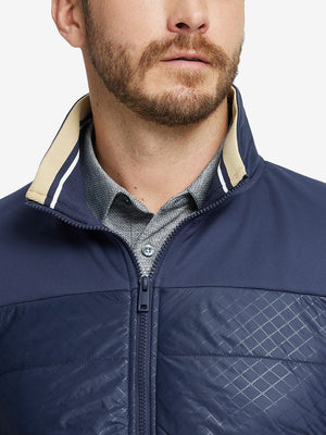 Close-up from nose to chest, showing collar detail and fleece texture of the Navy winter jacket.