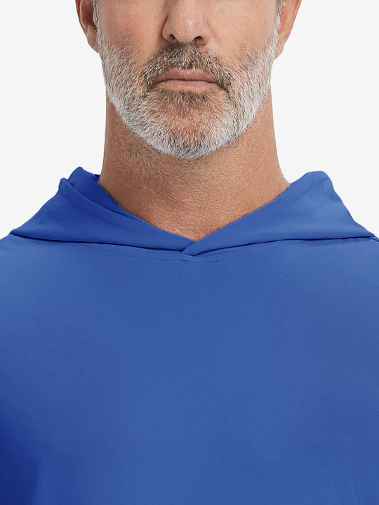 Close-up from nose to chest, showing soft collar texture and stitching detail of the klein blue hoodie.