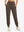 Model wearing women's stretch fleece lined water resistant joggers in coffee brown, showcasing the front lower body view.