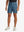 GRAYISH BLUE 4-way Stretch Performance Solid Shorts, golfer front lower body with club, 7 Inch view
