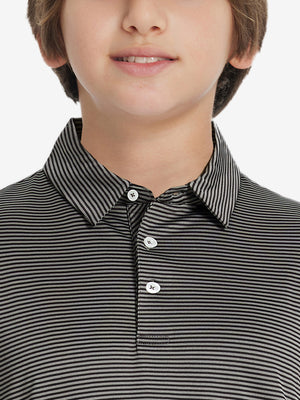 Front view of youth wearing black stripe performance cooling polo, showing collar and chest fit