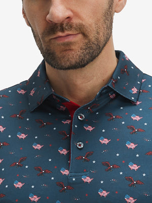 Front view from nose to chest of model wearing the american flag eagle 4 way stretch print collared polo shirt, showcasing the upper fit