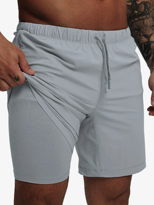 Front lower-body view from waist to knees showing stretch of LIGHT GREY 2 in 1 Running Sports Shorts with Liner