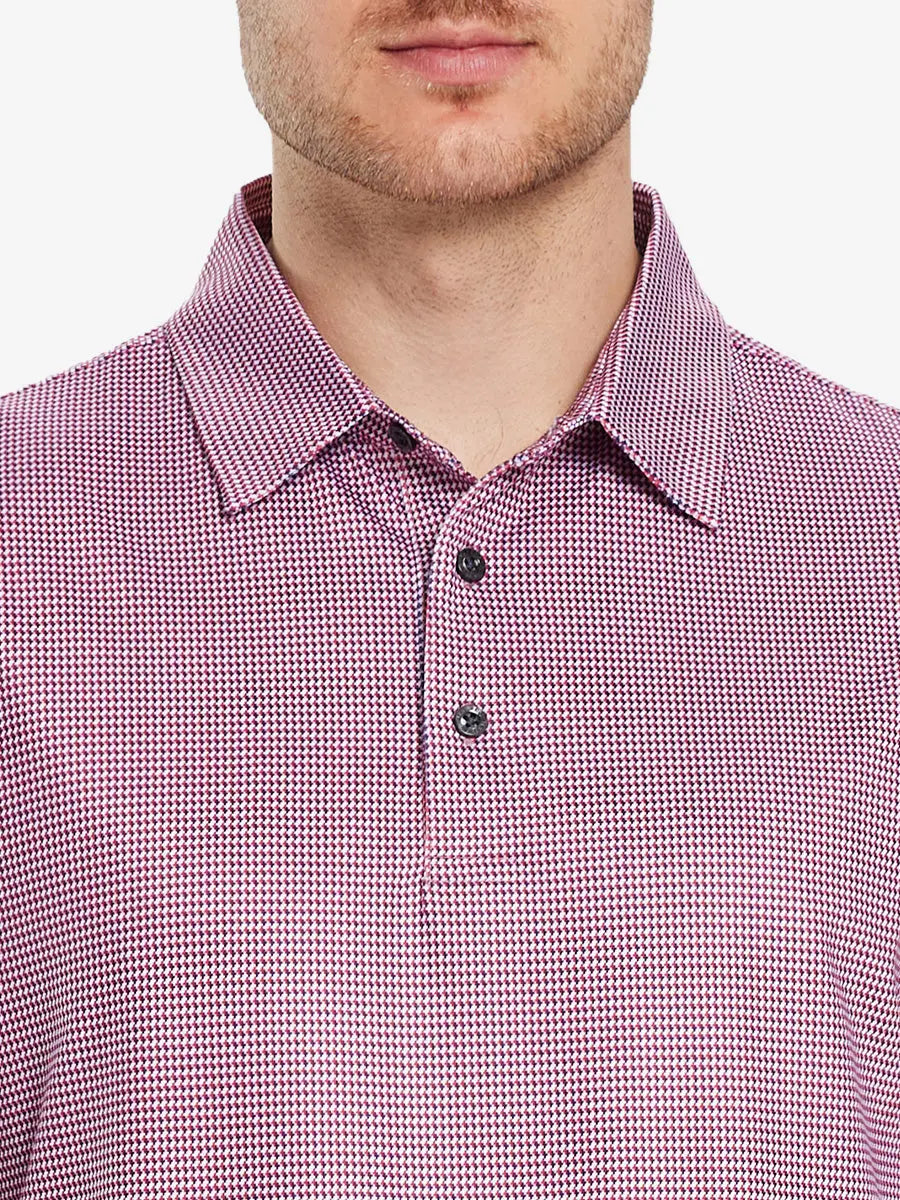 Model wears a RED PUZZLE BLOCK golf polo shirt, which emphasizes its cut and comfort when viewed from nose to chest