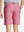 Back view of youth in pink Heather Performance Golf Shorts, highlighting rear design and fit