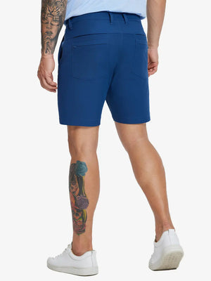 Back lower-body view of model in BLUE INDIGO Water Resistant Versatile 8 Pockets Shorts.