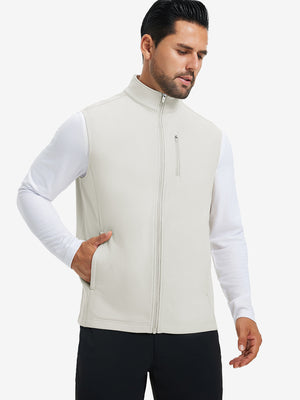 Model wearing water-resistant fleece golf vests, hand in side pocket, relaxed fit in oyster grey