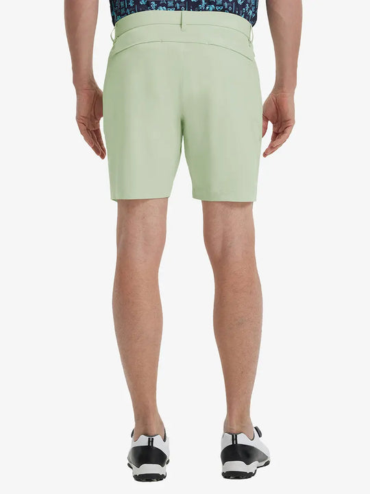 Back view of Player Fit Versatile Solid Shorts 7 Inch, showing tailored fit and clean lines – LIGHT GREEN