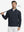 Full body model holding golf club in Premium jacquard quarter zip pullover, navy style