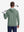 Model back upper body display shot, heather midlayer golf hoodies in celadon green heather