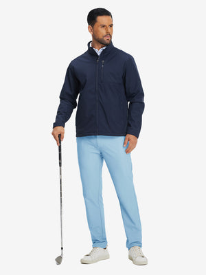 Model holding a golf club, wearing lightweight flat front casual trousers in light blue, full-body view.