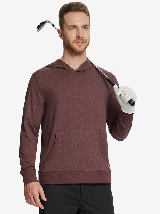 Model holding a golf club, dressed in the Brick Heather Athletic Golf Hoodie with a sleek fit.