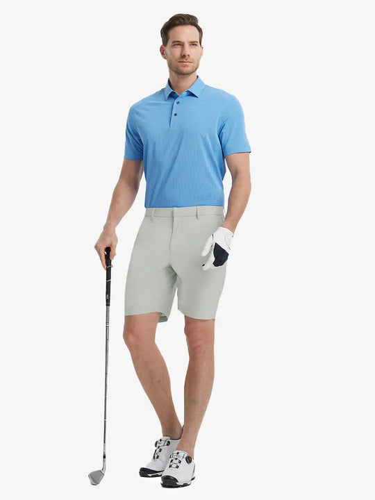 Full-body front shot of model holding golf club, wearing Player Fit Versatile Solid Shorts 9 Inch – GLACIER GREY