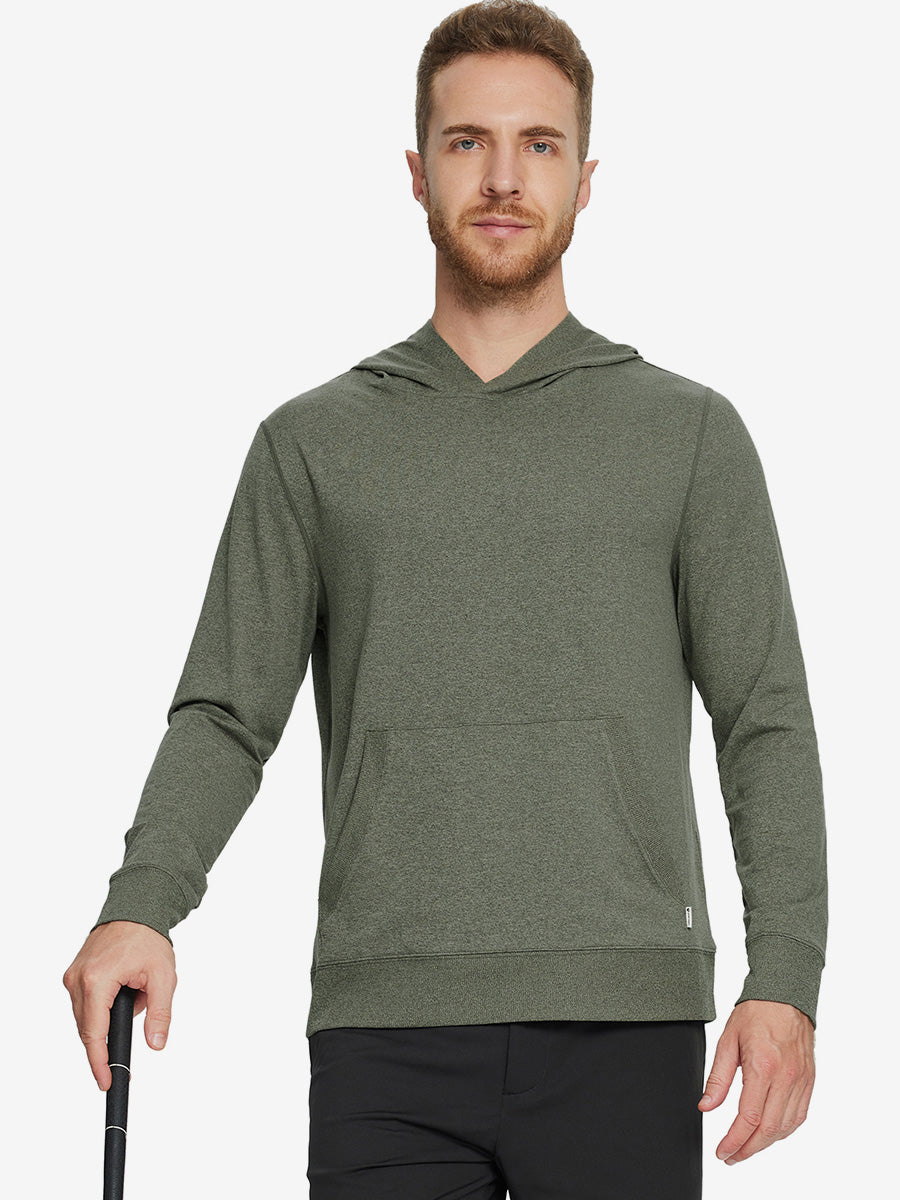 Model holding a golf club, dressed in the Brick Heather Athletic Golf Hoodie with a sleek fit.