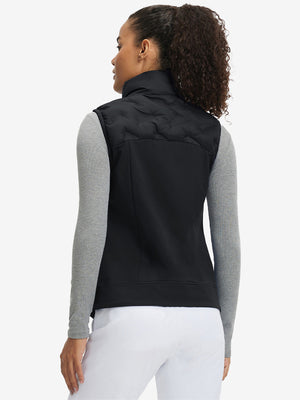 Back view of model in women's lightweight slim-fit puffer vest, showing shape and black tone