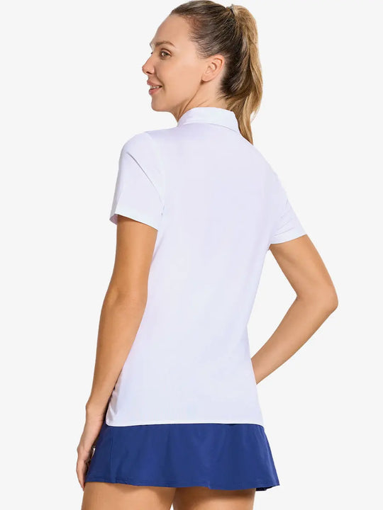 Back-side half-body shot of model in WHITE Women's Performance Solid Polo, looking over shoulder