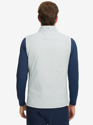 Back view of model wearing Lightweight Water Resistant Puffer Vest in light grey heather