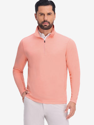 Front upper body shot of model wearing orange red grid featherweight midlayer quarter zip pullover