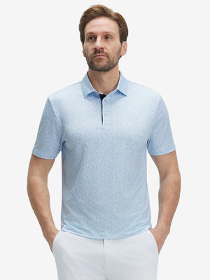 Front half-body shot of model wearing the light blue line leaf 4 way stretch print collared polo shirt for a casual sporty look