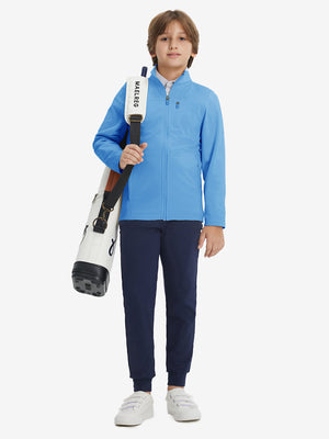 Full-body view of model wearing kids soft lightweight fleece lined jacket in sky blue, displaying the jacket's fit and design.