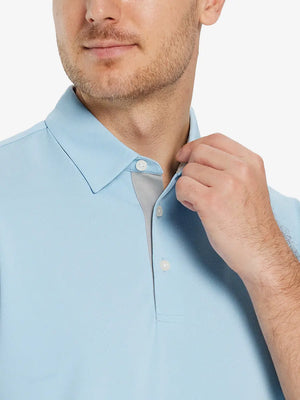 Model front close-up from nose to chest wearing SKY BLUE Ventilated Pique Performance Polo