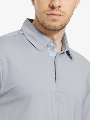Male model wearing the Silver Grey Everyday Classic Solid Polo, front view from nose to chest