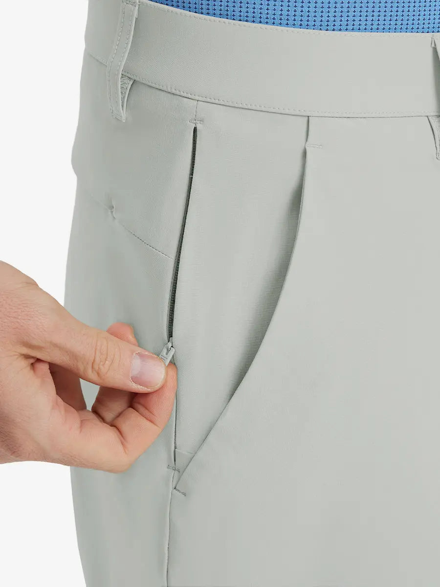 Close-up of right front pocket with zipper being opened on Player Fit Versatile Solid Shorts 7 Inch – GLACIER GREY