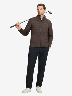 Front full body shot of model wearing coffee brown warm puffer winter golf jacket with golf club resting on shoulder