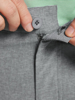 LIGHT GREY 9 Inch Heather Performance Golf Shorts close-up of waistband being stretched to show elasticity