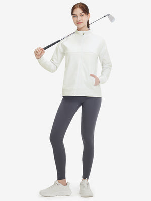 Women's Water-Resistant Stretch Fleece Lined Jacket in beige, model holding golf club 