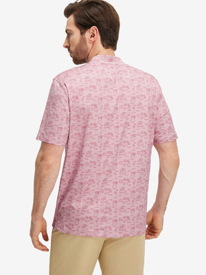 Back half-body of model in pink beach palm stretch printed collarless henley golf shirts