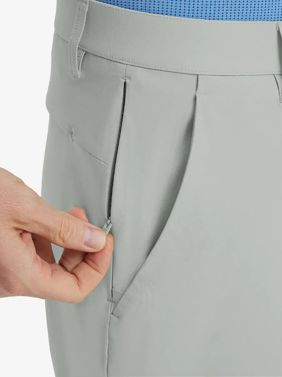 Close-up of right front pocket with zipper being opened on Player Fit Versatile Solid Shorts 9 Inch – NEUTRAL GREY