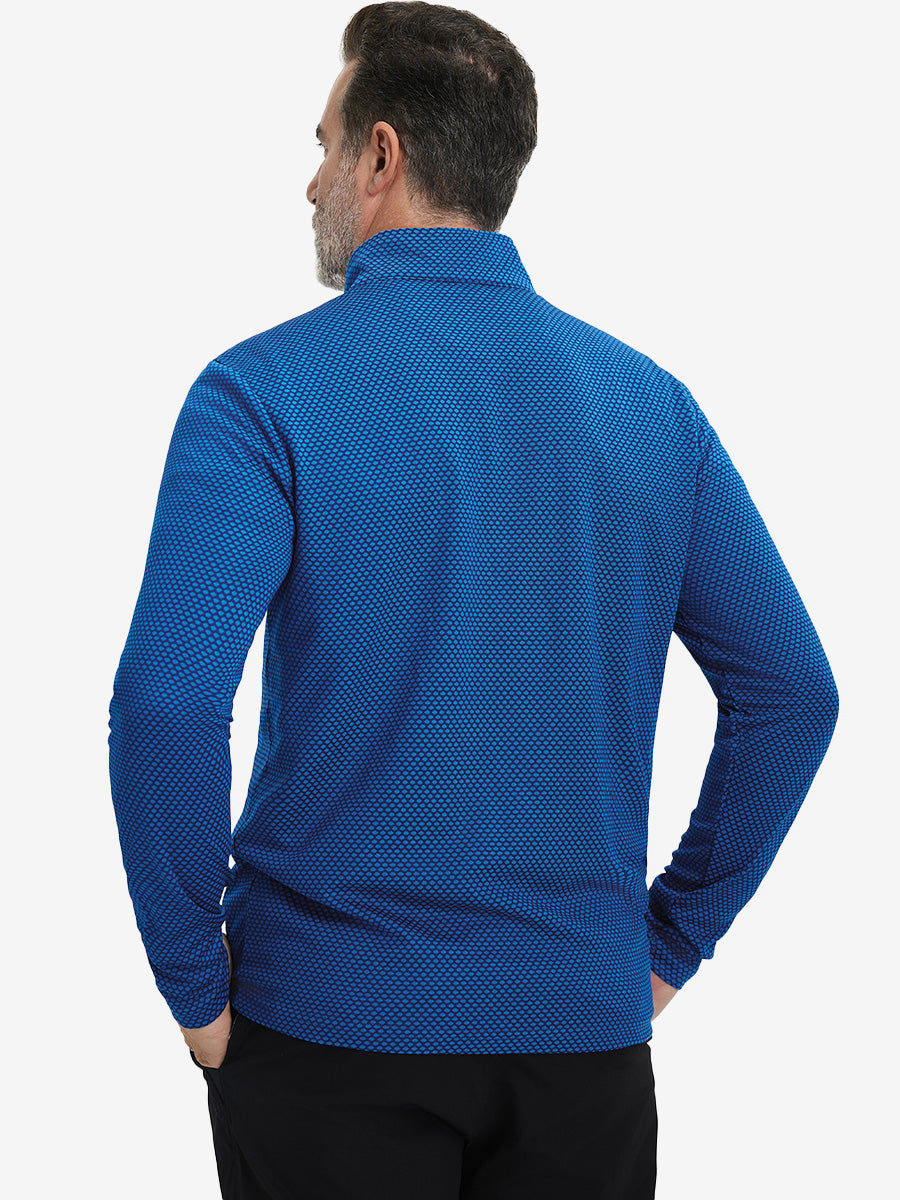 Back upper view of model wearing jacquard quarter zip pullover in cobalt, showing clean seam lines.