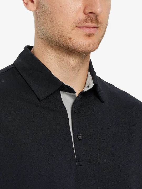 Model front close-up from nose to chest wearing BLACK Ventilated Pique Performance Polo