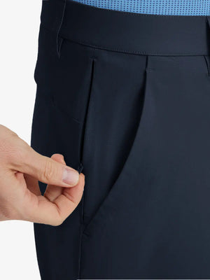 Close-up of right front pocket with zipper being opened on Player Fit Versatile Solid Shorts 9 Inch – NAVY
