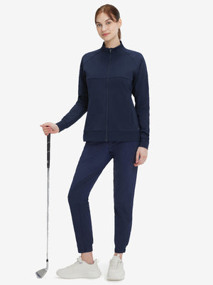 Women's Water-Resistant Stretch Fleece Lined Jacket in navy, model holding golf club 