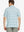 Back half-body view showcasing the clean lines of the Haze Blue White Yarn Dyed Stripe Polo