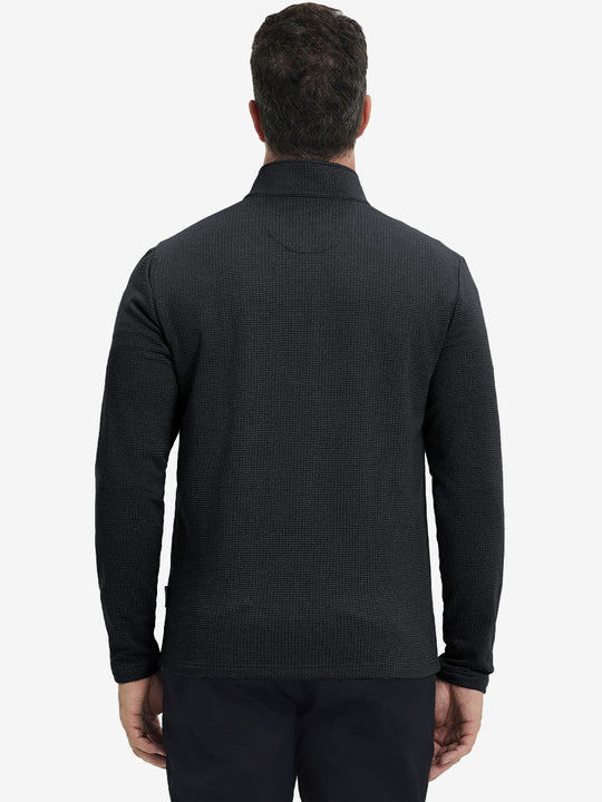 Back upper view of casual fleece lined quarter zip pullover in black, showing fit and seams.
