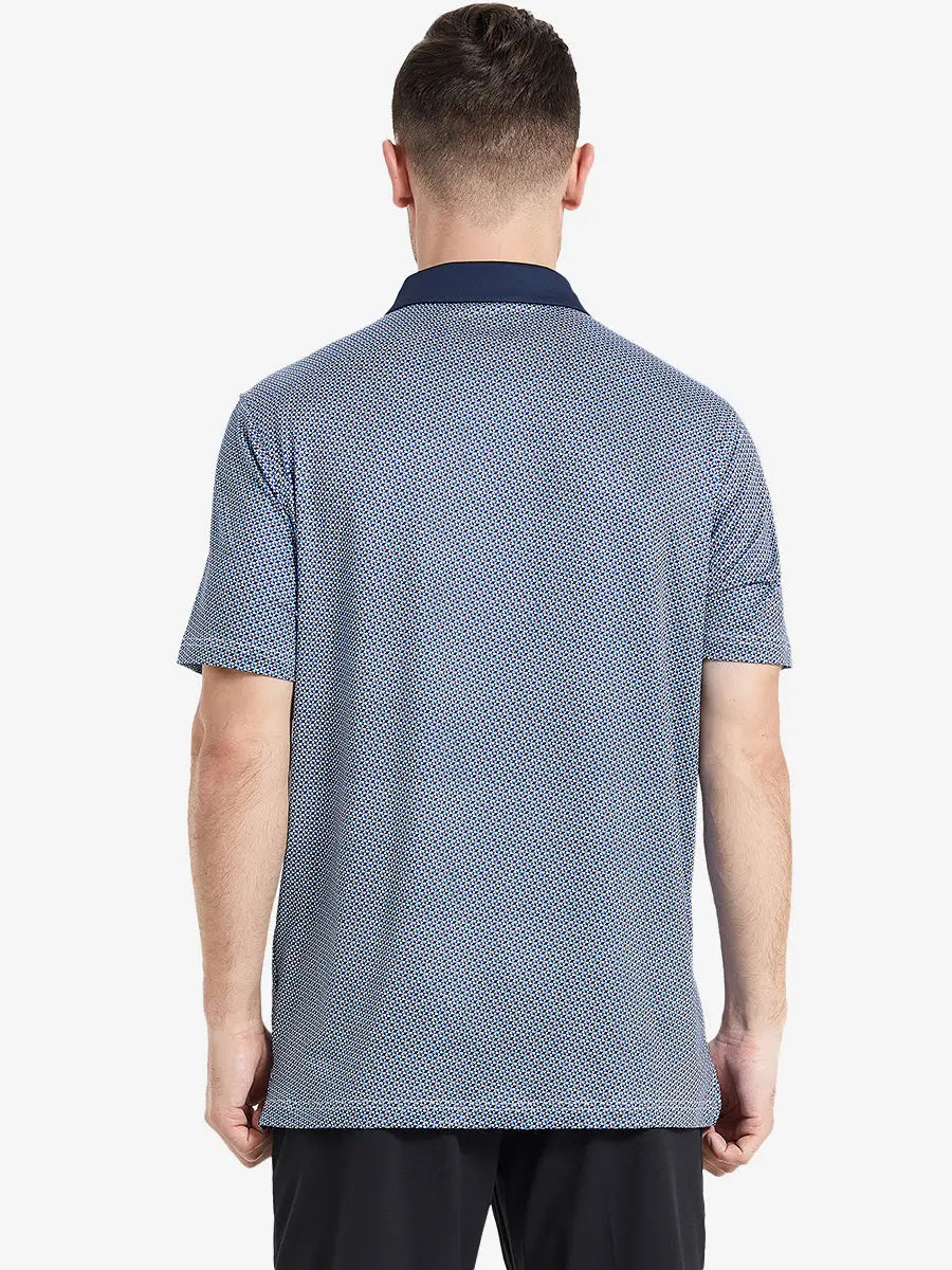 Back view of the model showcasing the bluish umbrella pattern polo, emphasizing fresh and natural design.