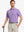 Model in LILAC/LIGHT BLUE STRIPE Polo holding golf club — relaxed and stylish