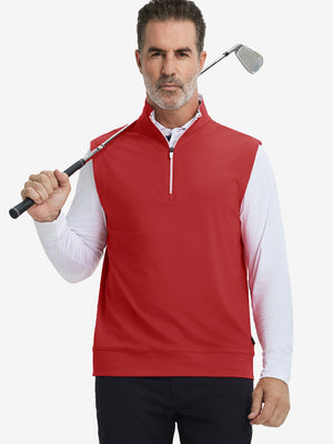 Model holding golf club, wearing print collar quarter zip golf vest in red, upper body view.