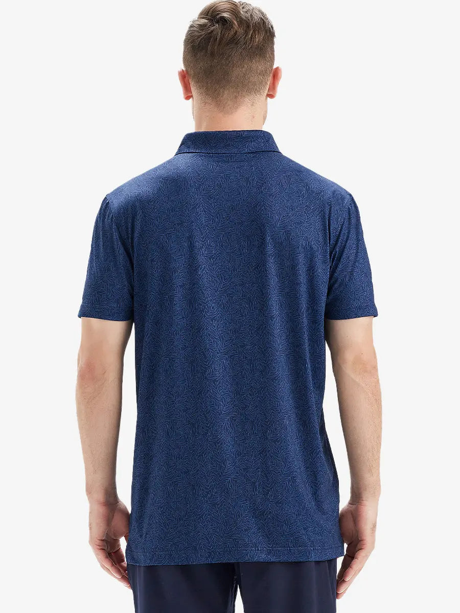 Model is wearing a navy blue leaf patterned polo shirt with a back view showing a natural and fresh design for casual and sporty wear.