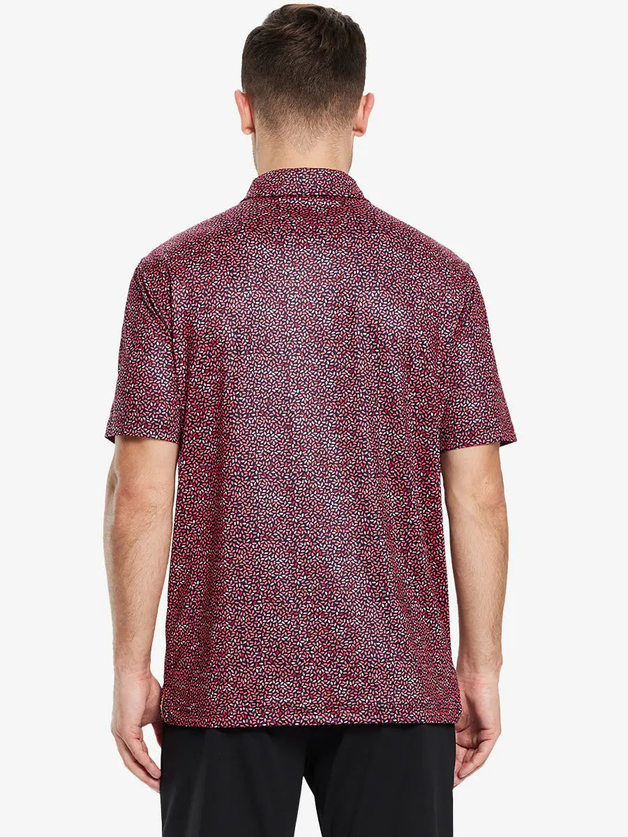 From the back, the model shows the back design of the SCARLET OVAL Polo shirt, clearly showing the shape and cut of the garment.