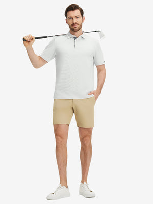 Full-body shot of a model holding a golf club, wearing the grey white feather weight jacquard polo shirts and pants