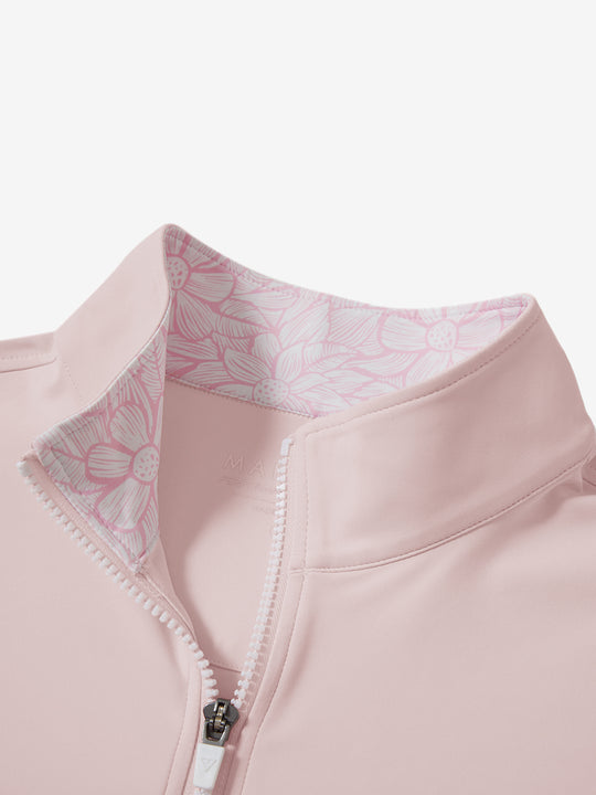 Collar zipper and inner neck pattern detail of the lightweight golf quarter zip pullover in light pink.