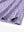 Hem slit detail of MAELREG Performance Jersey Print Polo in Lavender Seaside Palm – comfort & movement